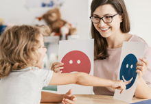 Emotion emoticons used by a psychologist during a therapy session with a child.