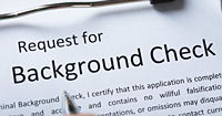 A zoomed in image of a background check screening request form.