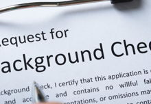 A zoomed in image of a background check screening request form.